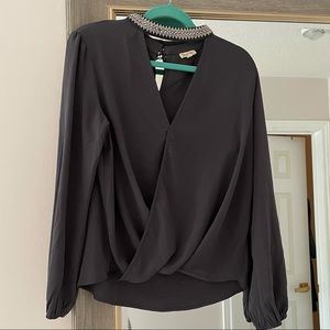 Grey blouse with jewelled cuff neck